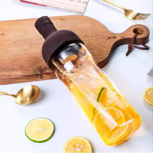 A cold brew infuser bottle with fruits inside it. 